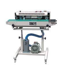 Continuous band sealer with air inflating